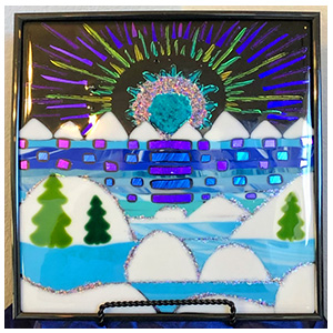 Winter Moonlight In Lake Tahoe, 12” x 12” frames dichroic glass art panel. Lake Tahoe Winter Themed Glass Art